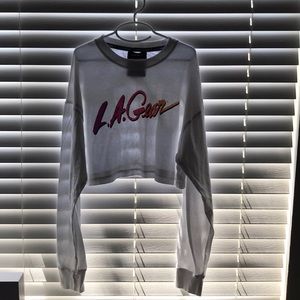 long sleeve shirt, (LA GEAR). (FITS SMALL TOO)